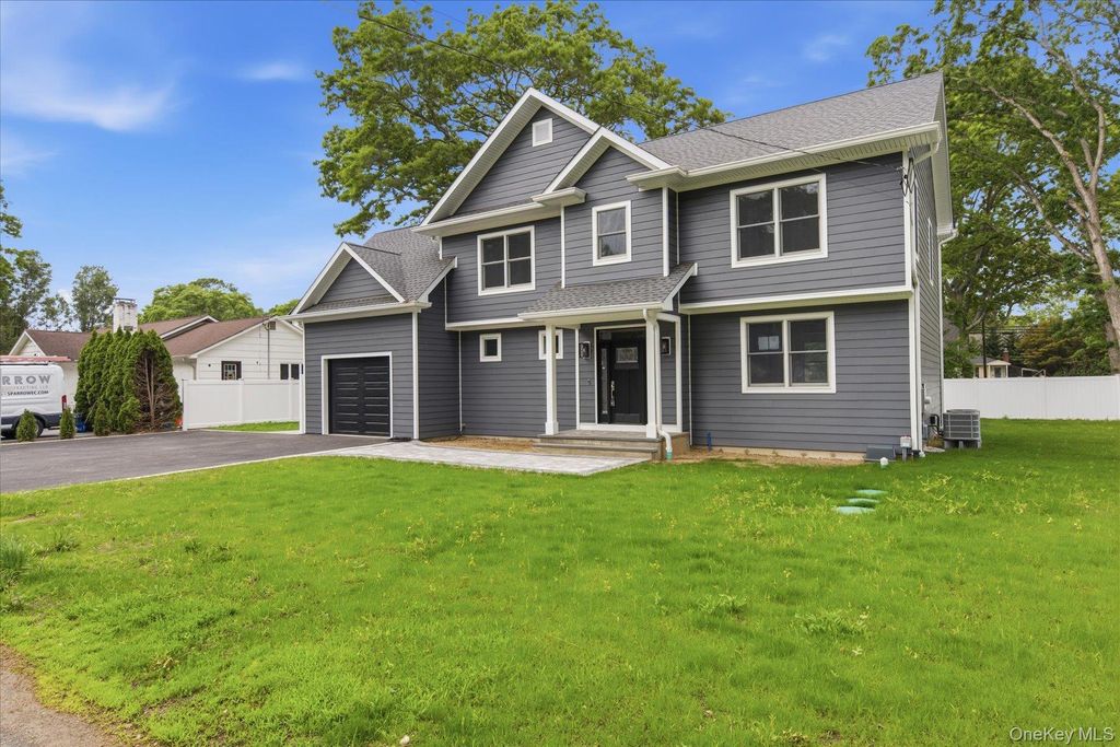 Photo of 218 W Tyler Avenue, Miller Place, NY 11764 (MLS # 995050)