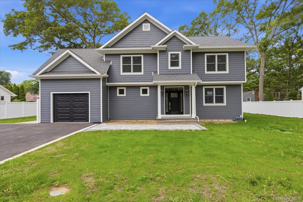 Photo of 218 W Tyler Avenue, Miller Place, NY 11764 (MLS # 995050)