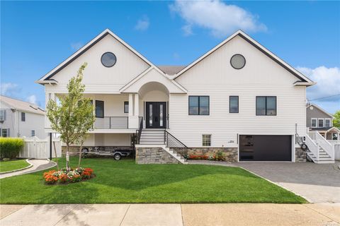 Photo of 894 S Long Beach Avenue, Freeport, NY 11520 (MLS # 857396) Photo of 894 S Long Beach Avenue, Freeport, NY 11520 (MLS # 857396)