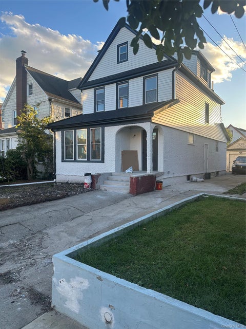 Photo of 104-42 204 St St, Saint Albans, NY 11412 (MLS # 1065418)