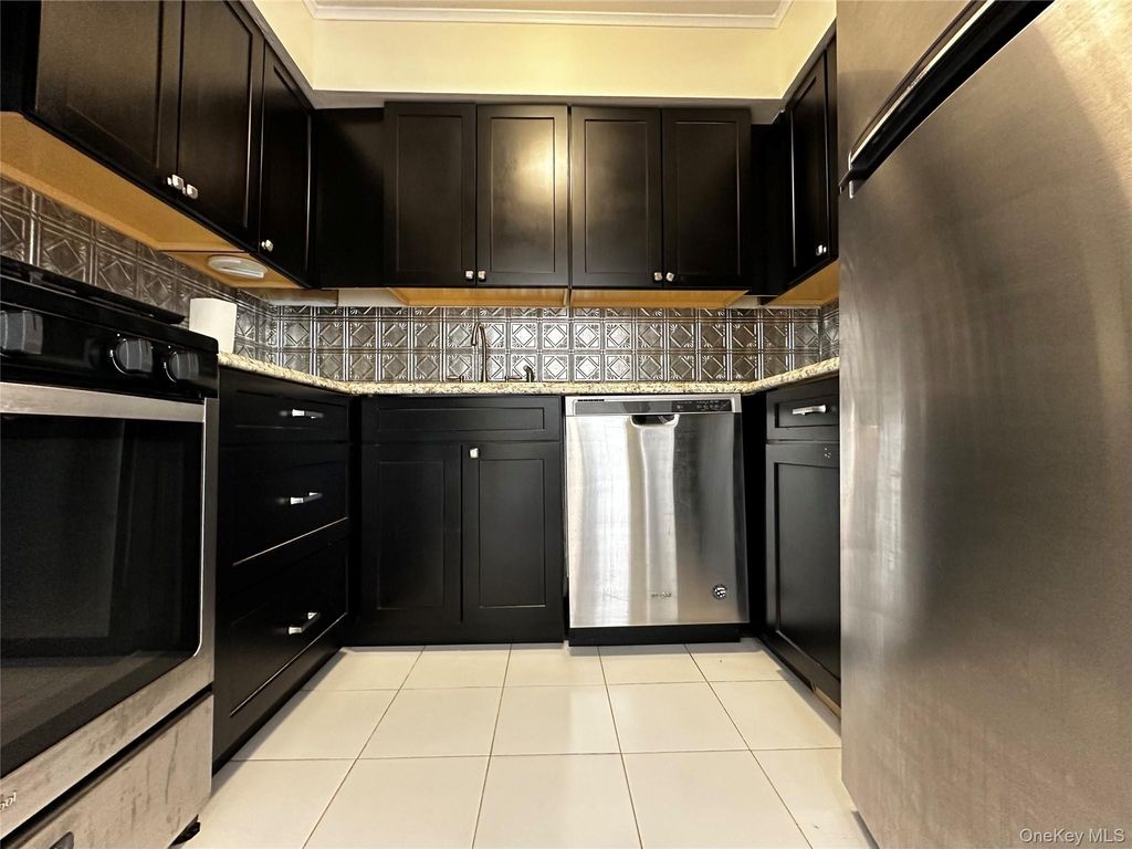 Photo of 9 Bailey Court #9, Middle Island, NY 11953 (MLS # 965672)