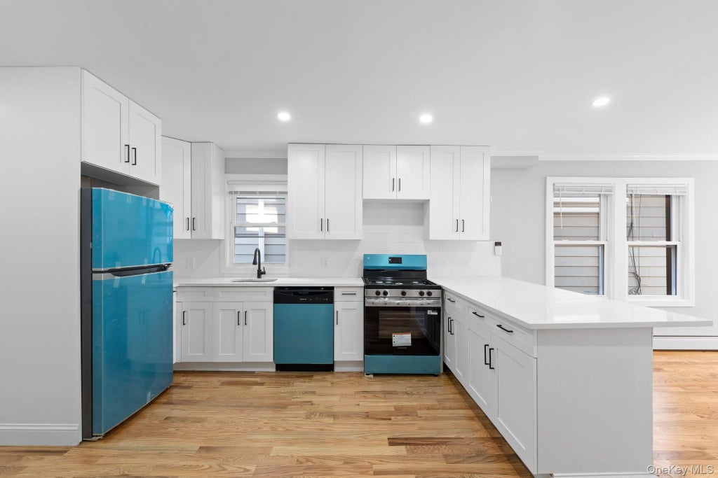 Photo of 14206 116th Avenue, Jamaica, NY 11436 (MLS # 1011399)