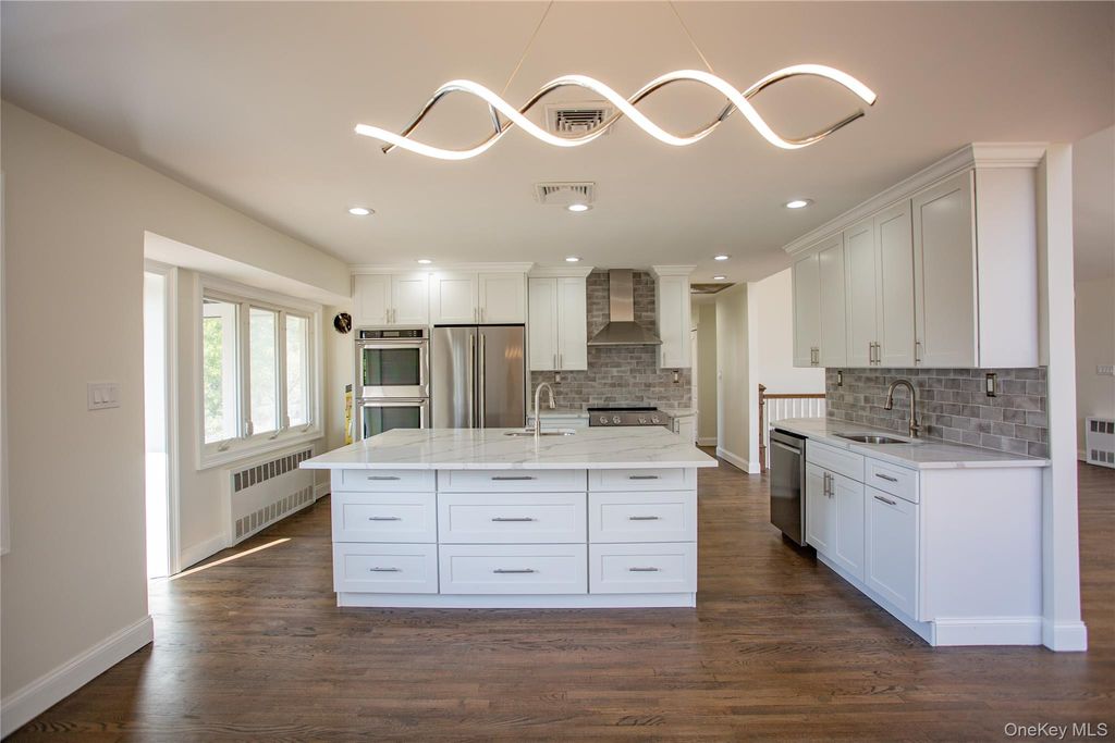 Photo of 988 Westwood Road, Woodmere, NY 11598 (MLS # 1000413)