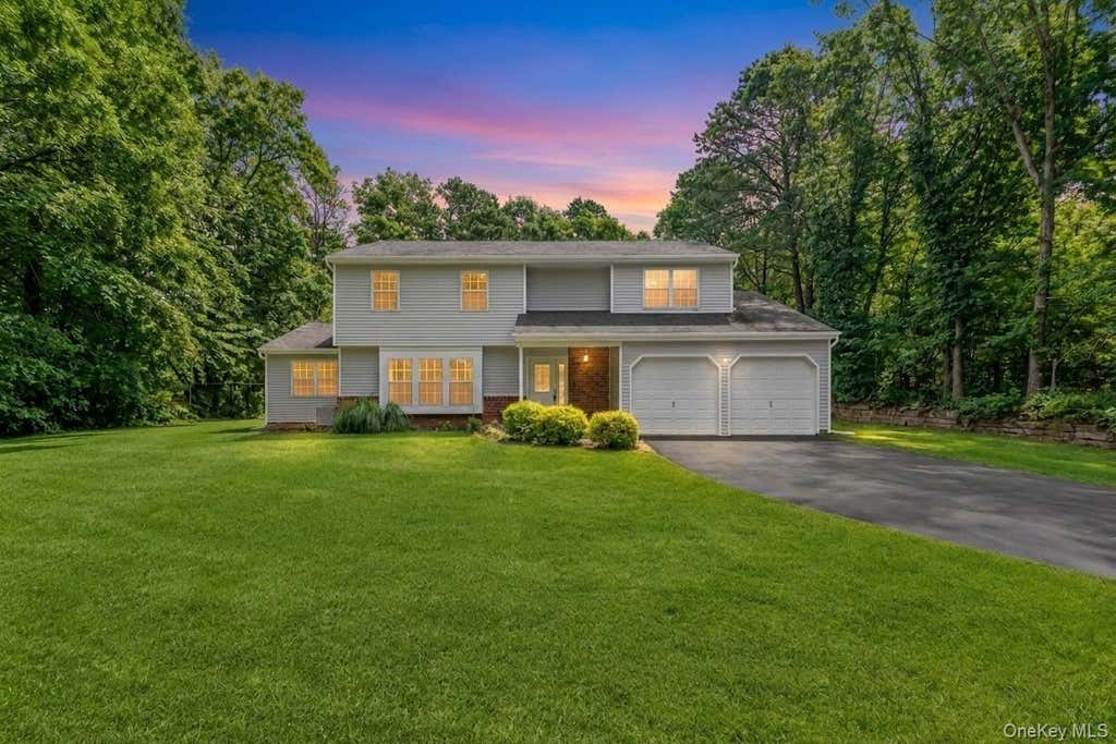 Photo of 11 Bates Lane, Ridge, NY 11961 (MLS # 1032928)