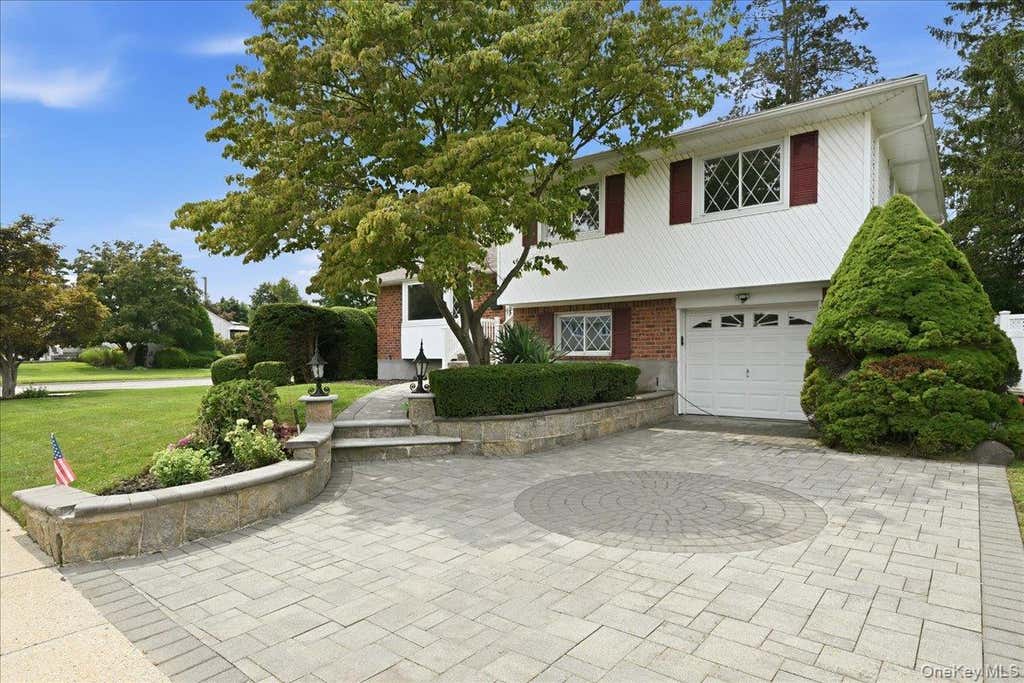 Photo of 90 Grohmans Lane, Plainview, NY 11803 (MLS # 1039211)