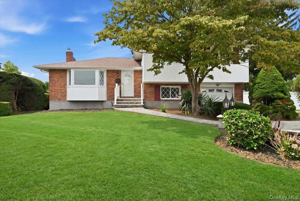 Photo of 90 Grohmans Lane, Plainview, NY 11803 (MLS # 1039211)