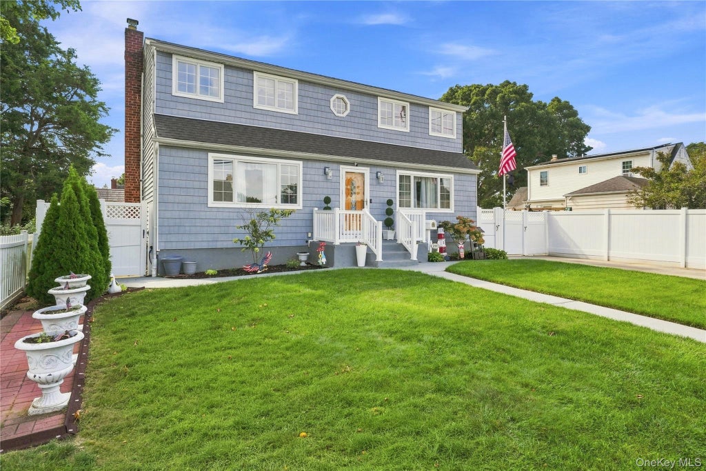 Photo of 310 Audley Court, Copiague, NY 11726 (MLS # 1048906)