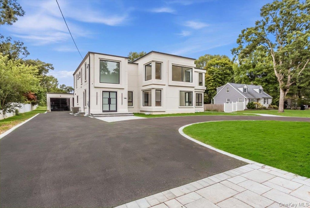 Photo of 1080 Westminster Avenue, Dix Hills, NY 11746 (MLS # 1051281)