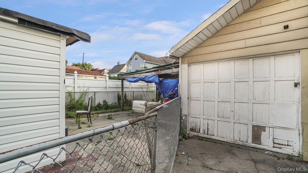 Photo of 9520 127th Street, Richmond Hill, NY 11419 (MLS # 1065966)