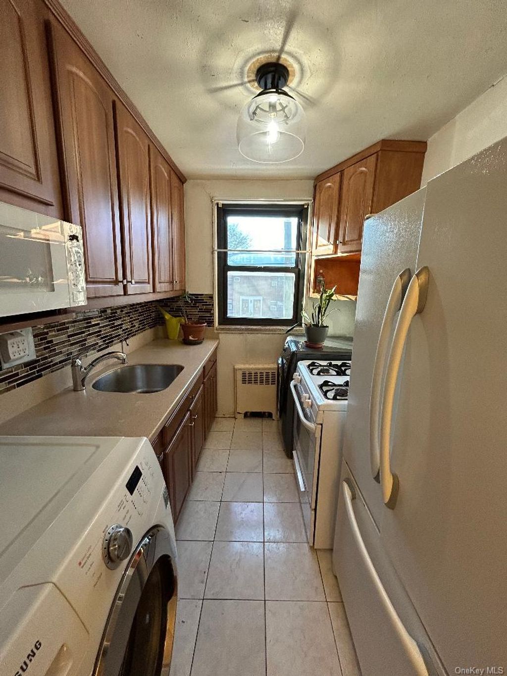 Photo of 16-41 160 St #6-420, Whitestone, NY 11357 (MLS # 957773)