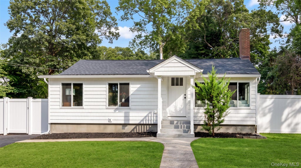 Photo of 8 Woodlawn Avenue, Selden, NY 11784 (MLS # 1056826)