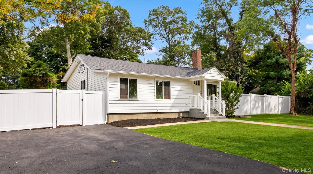Photo of 8 Woodlawn Avenue, Selden, NY 11784 (MLS # 1056826)