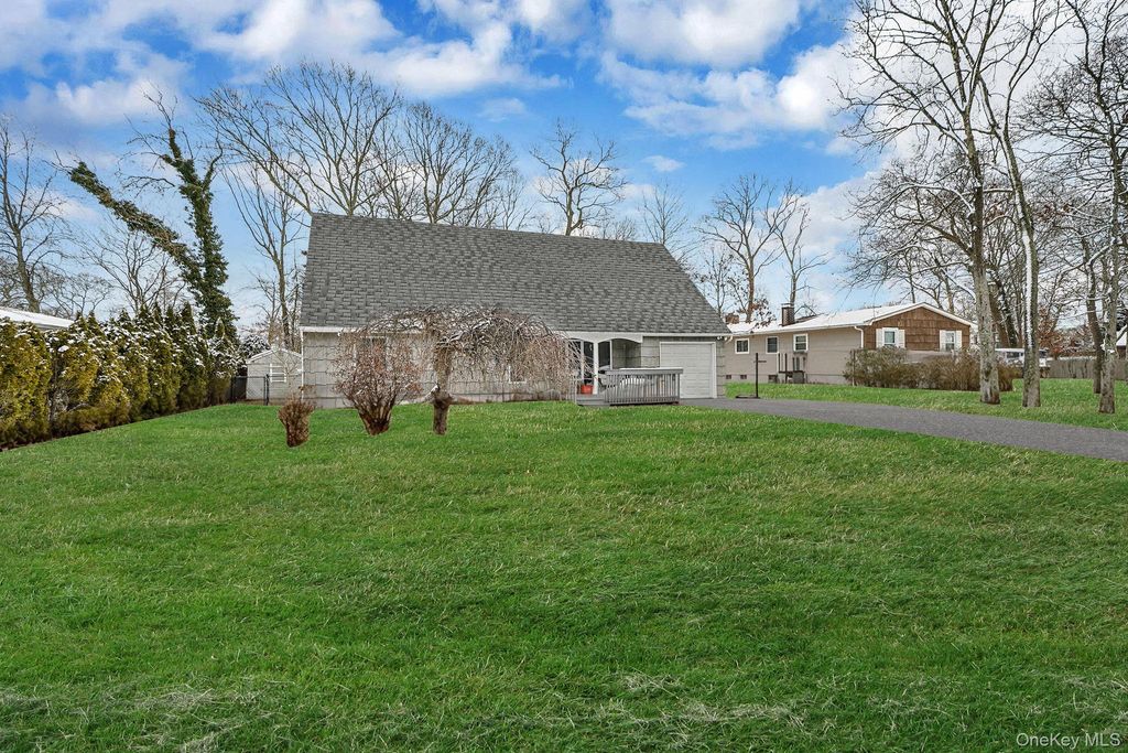 Photo of 47 Holiday Boulevard, Center Moriches, NY 11934 (MLS # 963037)