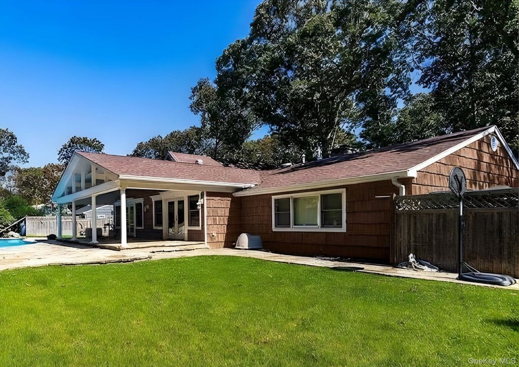 Photo of 22 Redwood Drive, Great River, NY 11739 (MLS # 961148)