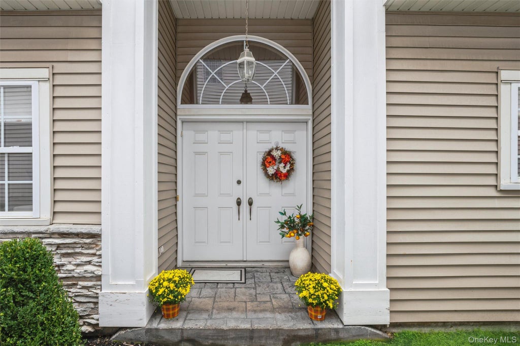 Photo of 77 Hamlet Drive, Hauppauge, NY 11788 (MLS # 1056668)