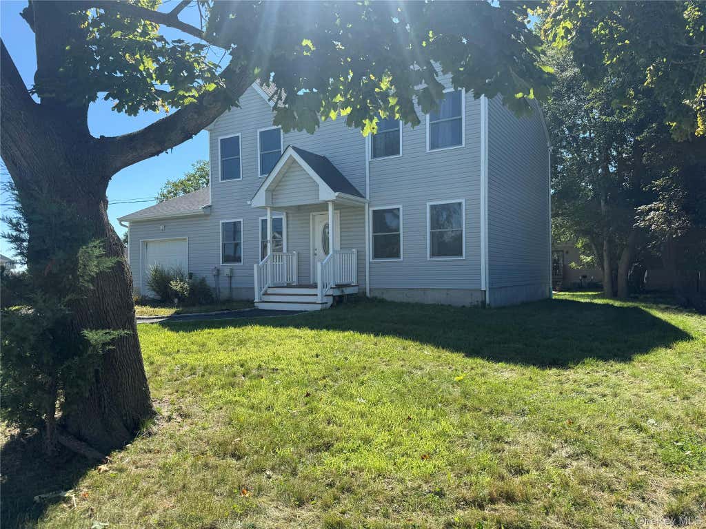 Photo of 8 W Narcissus Road, Mastic Beach, NY 11951 (MLS # 1042865)
