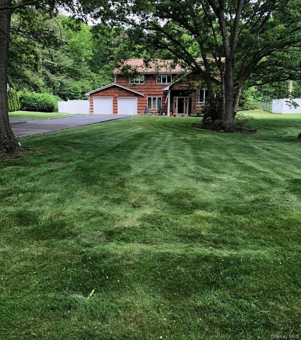 Photo of 29 Wintergreen Drive, Melville, NY 11747 (MLS # 1021765)