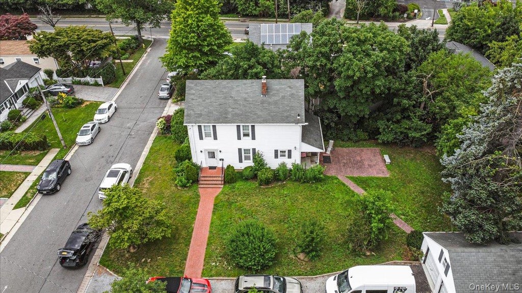 Photo of 1 4th Street, Westbury, NY 11590 (MLS # 1068935)