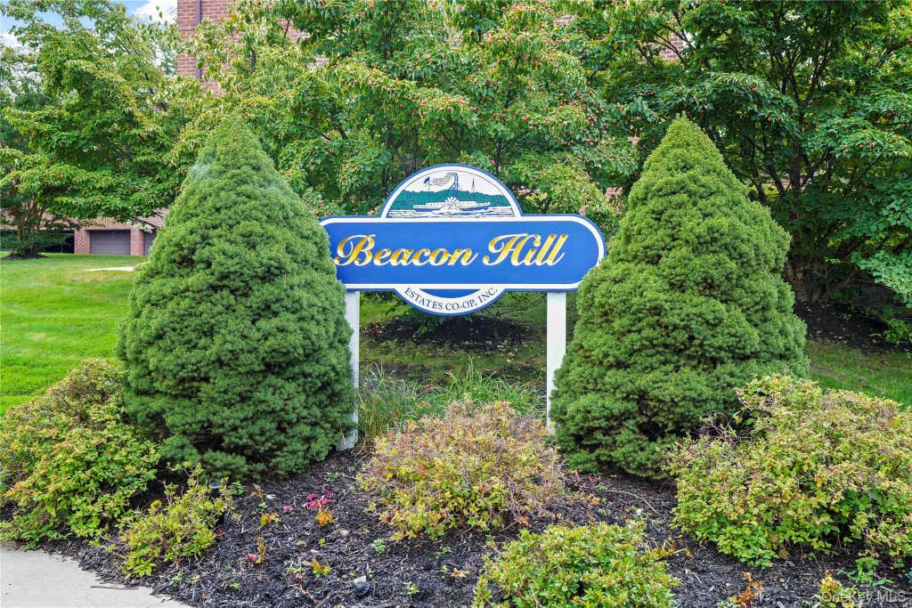 Photo of 113 Beacon Hill Dr DR #E25, Dobbs Ferry, NY 10522 (MLS # 1035694)