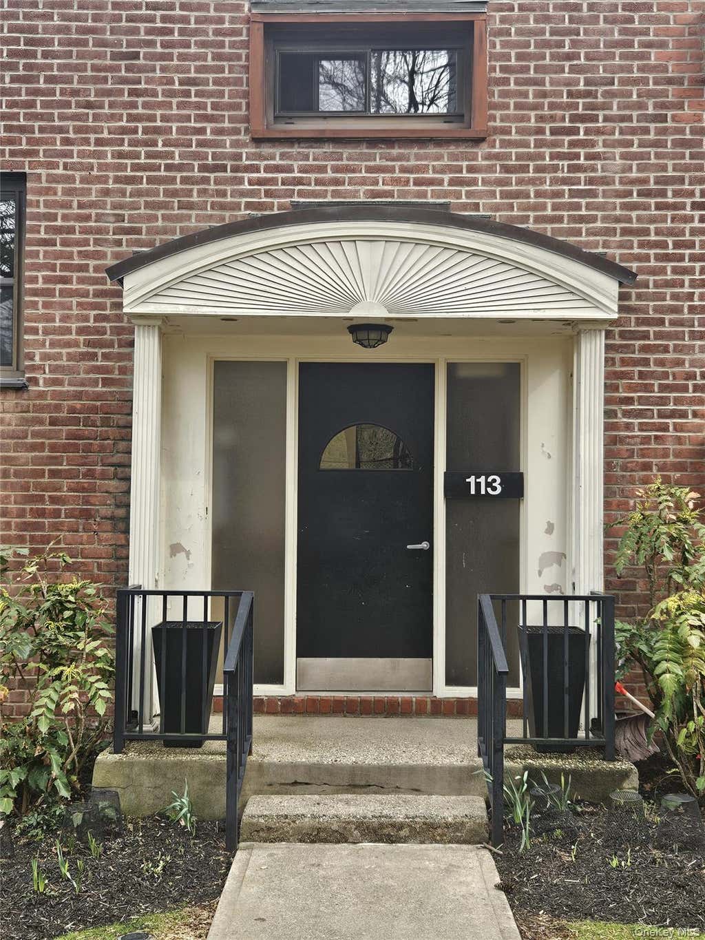 Photo of 113 Beacon Hill Dr DR #E25, Dobbs Ferry, NY 10522 (MLS # 1035694)