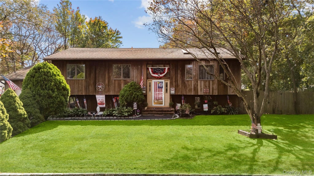 Photo of 14 Mineola Street, Holtsville, NY 11742 (MLS # 1058722)