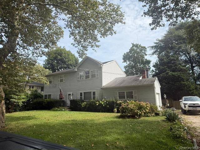 Photo of 97 Hiawatha Drive, Brightwaters, NY 11718 (MLS # 1052650)