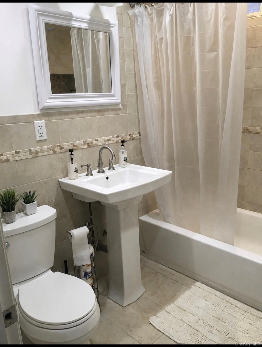 Photo of 9419 Pitkin Avenue, Ozone Park, NY 11417 (MLS # 1017072)