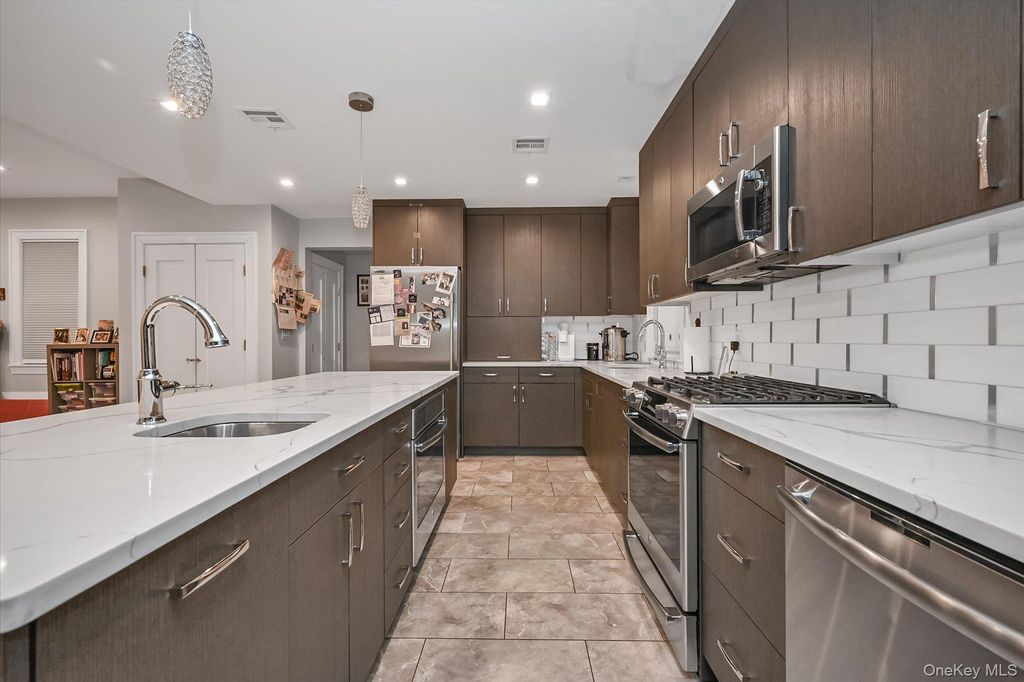 Photo of 8405 112th Street, Richmond Hill, NY 11418 (MLS # 963084)