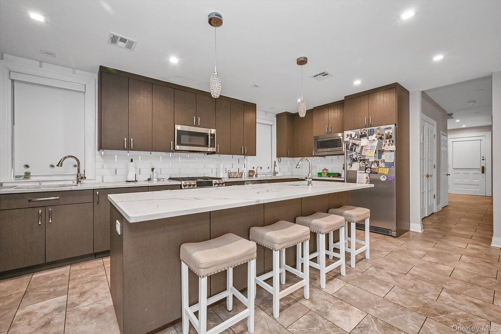 Photo of 8405 112th Street, Richmond Hill, NY 11418 (MLS # 963084)