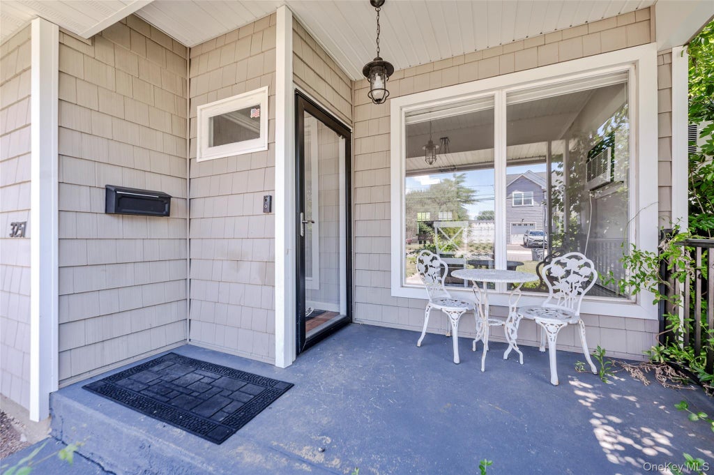 Photo of 3251 Neptune Avenue, Oceanside, NY 11572 (MLS # 1055287)