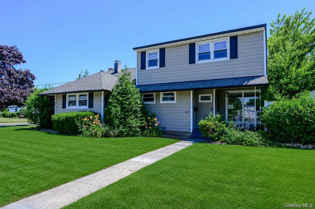 Photo of 3251 Neptune Avenue, Oceanside, NY 11572 (MLS # 1055287)