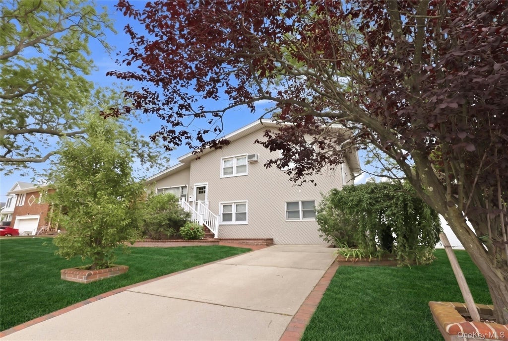 Photo of 228 Island Parkway W, Island Park, NY 11558 (MLS # 1030642)