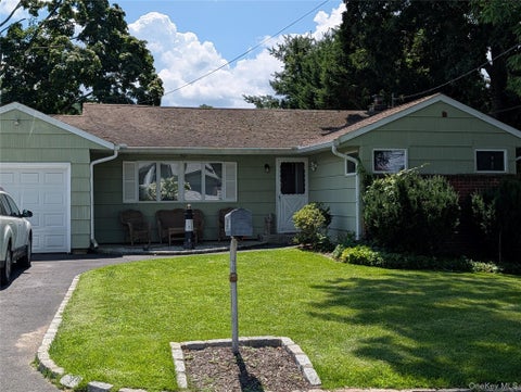 Photo of 35 Sheridan Street, Huntington, NY 11743 (MLS # 1051996)