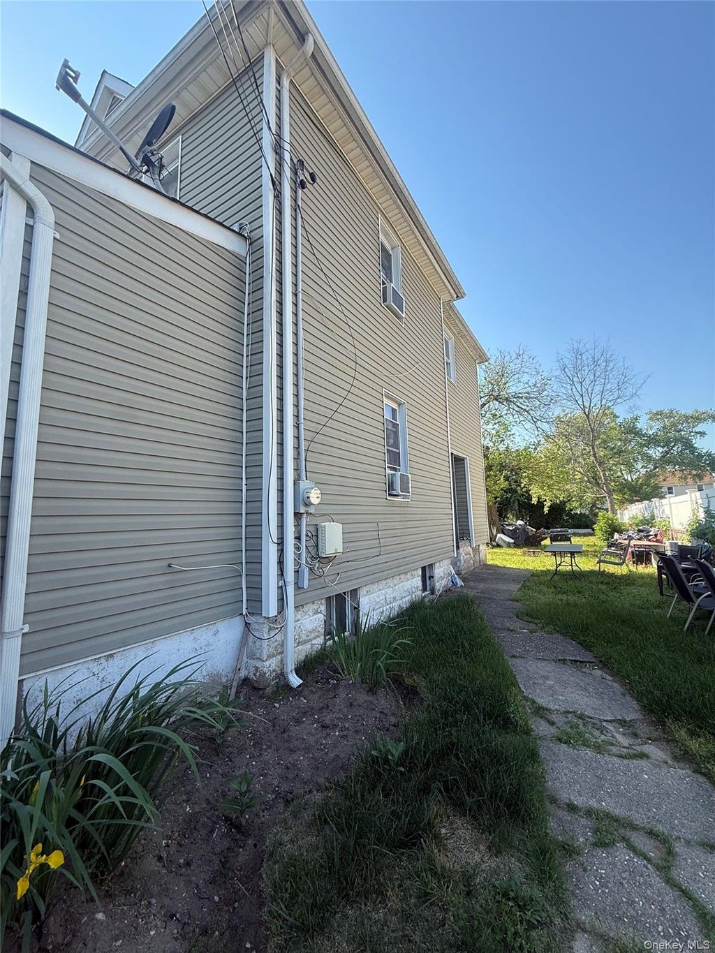 Photo of 39 Pleasant Avenue, Roosevelt, NY 11575 (MLS # 1011849)