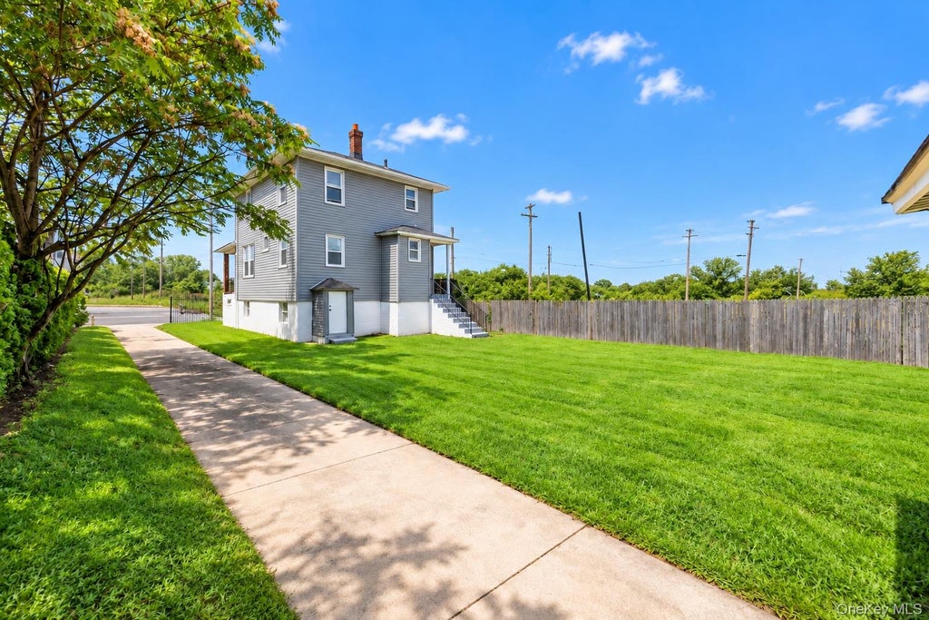 Photo of 1442 Pinson Street, Far Rockaway, NY 11691 (MLS # 1050248)