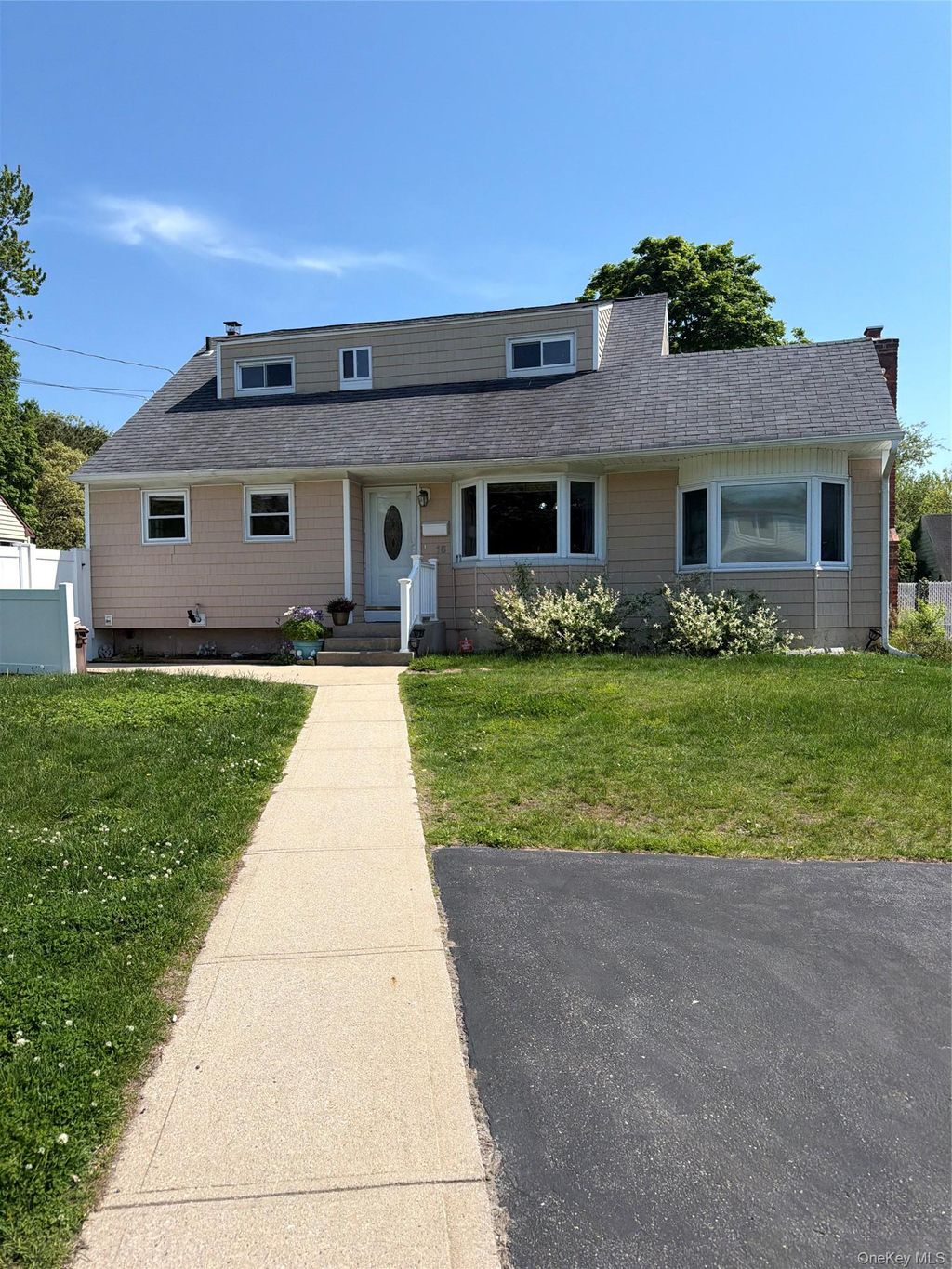 Photo of 16 Kopf Street, Brentwood, NY 11717 (MLS # 1002998)