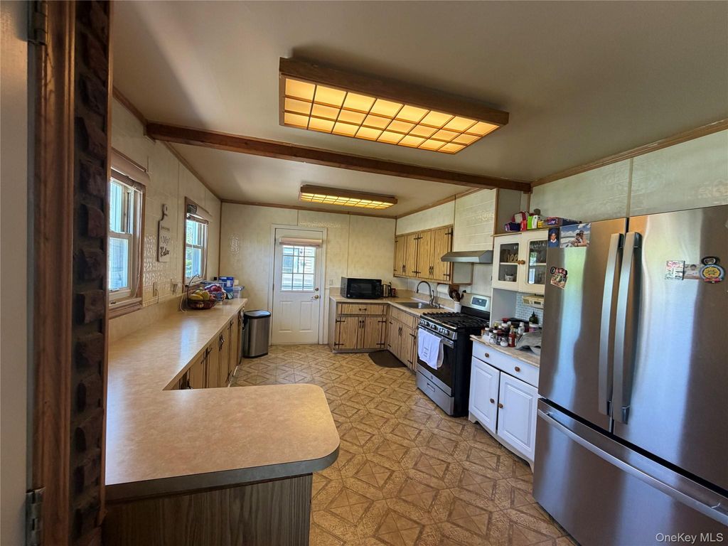 Photo of 16 Kopf Street, Brentwood, NY 11717 (MLS # 1002998)