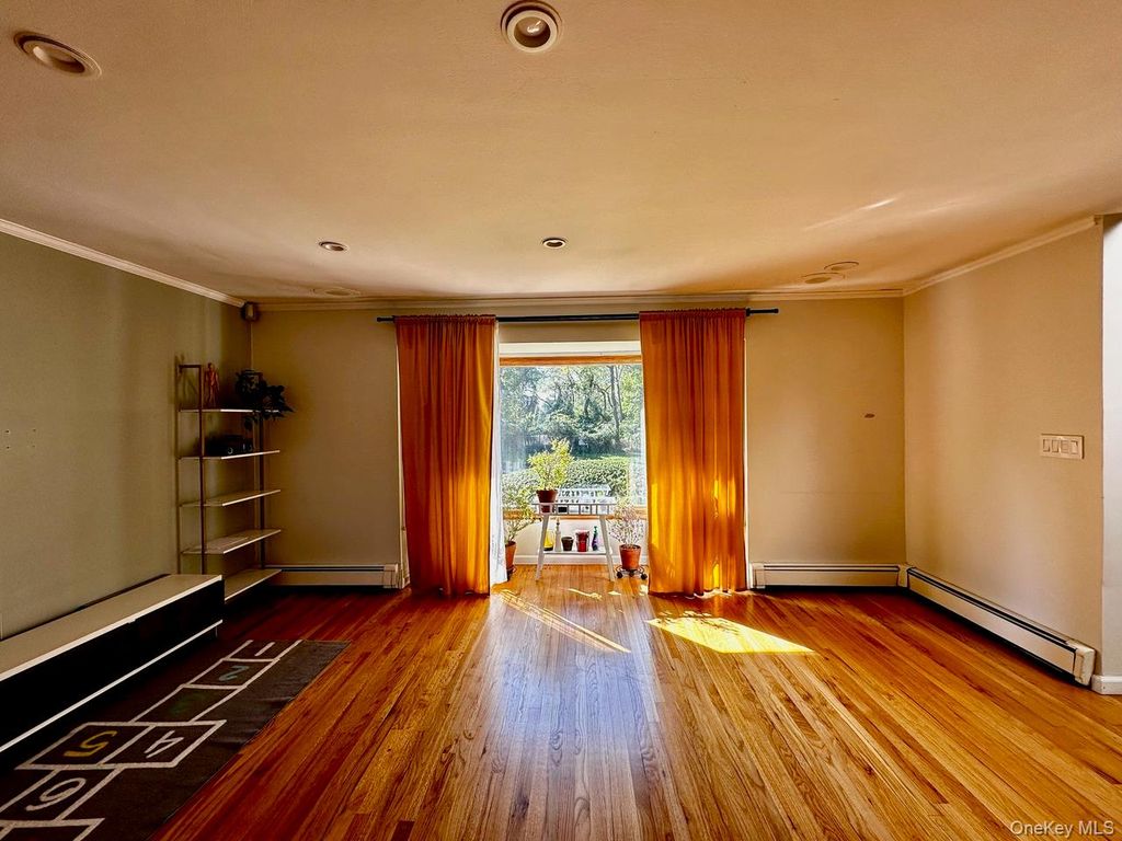 Photo of 26 Canterbury Road, Woodbury, NY 11797 (MLS # 942967)