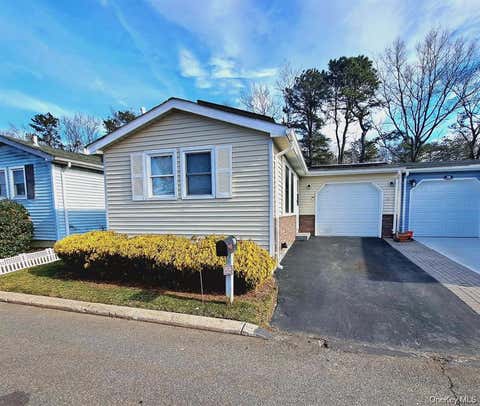 Homes For Sale - 21 Village Circle<br/> Manorville, NY 11949
