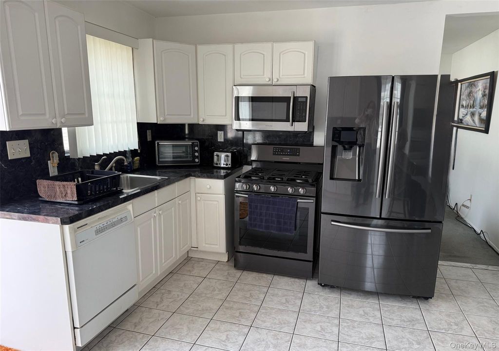 Photo of 157 Ontario Avenue, Massapequa, NY 11758 (MLS # 980837)