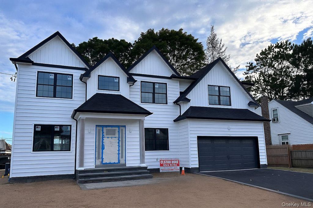 Photo of 214 N Cedar Street, Massapequa, NY 11758 (MLS # 922395)