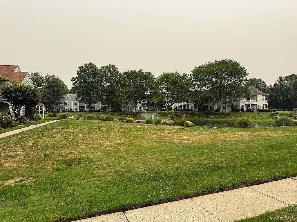 Photo of 159 Fairview Circle #291U, Middle Island, NY 11953 (MLS # 1027778)