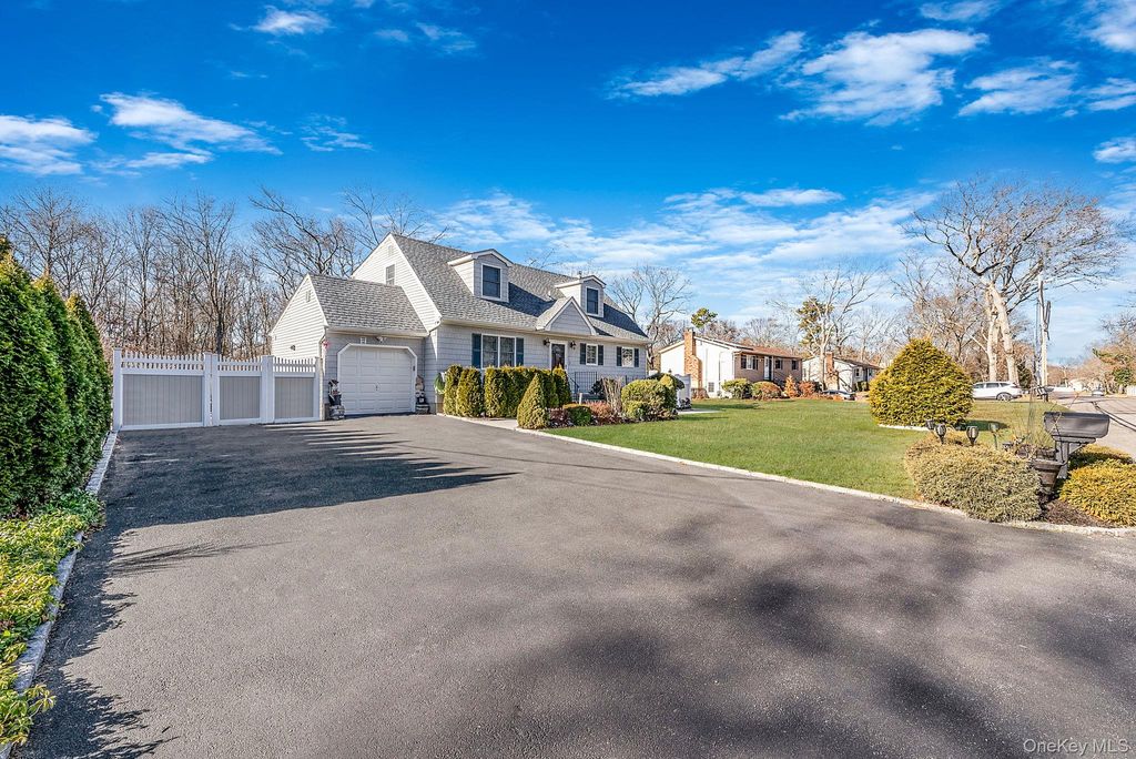 Photo of 20 Howe Road, Coram, NY 11727 (MLS # 950077)