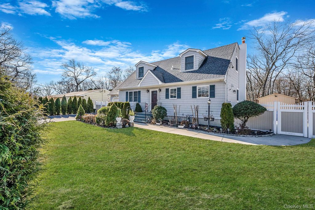 Photo of 20 Howe Road, Coram, NY 11727 (MLS # 950077)