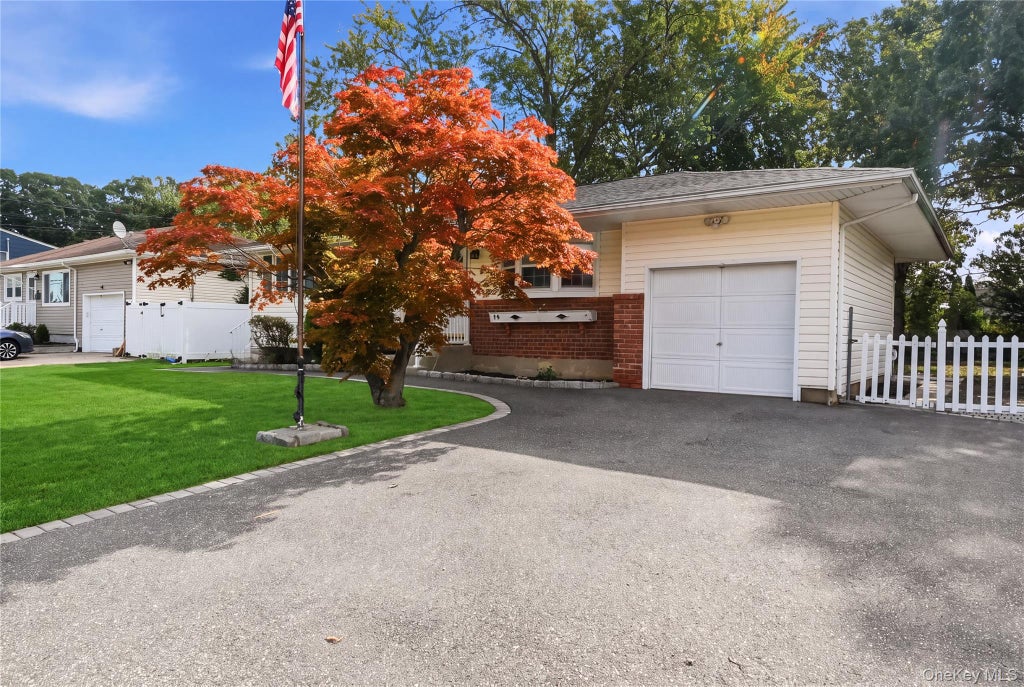 Photo of 56 Prairie Drive, North Babylon, NY 11703 (MLS # 1062455)