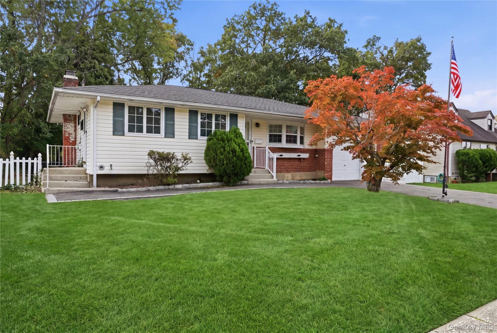 Photo of 56 Prairie Drive, North Babylon, NY 11703 (MLS # 1062455)
