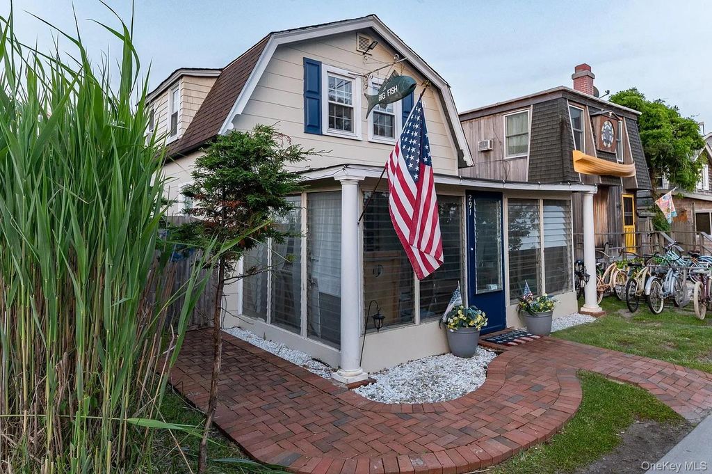 Photo of 291 Cottage Walk, Ocean Beach, NY 11770 (MLS # 997037)
