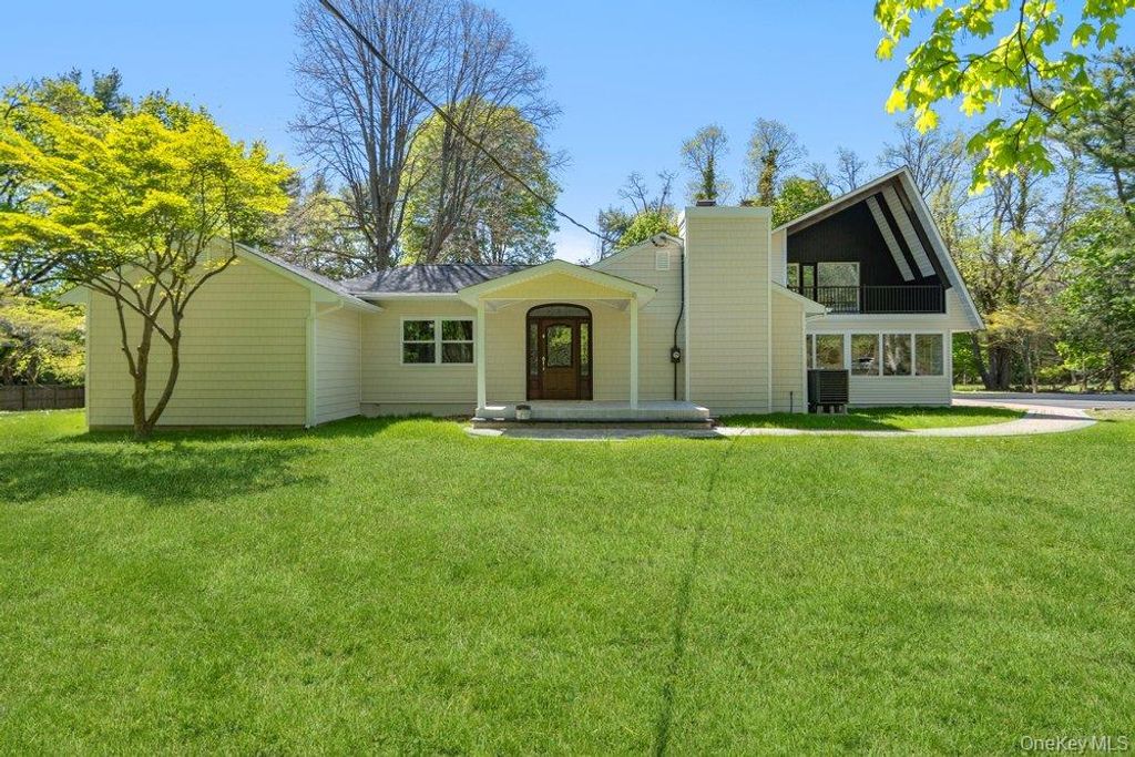 Photo of 497 Woodbury Road, Cold Spring Harbor, NY 11724 (MLS # 999684)