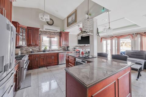 Photo of 17 Riverside Avenue, Mastic Beach, NY 11951 (MLS # 955567)