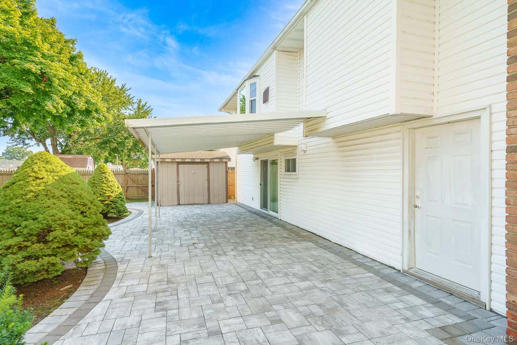 Photo of 221 Roosevelt Avenue, Massapequa Park, NY 11762 (MLS # 1041750)